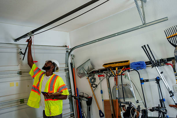 Professional Garage Door Panel Replacement technician working in Roosevelt, NJ